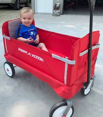 Child smiling in Wagon