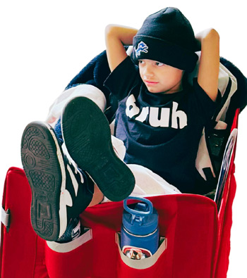 Child smiling in Warrior Wagon